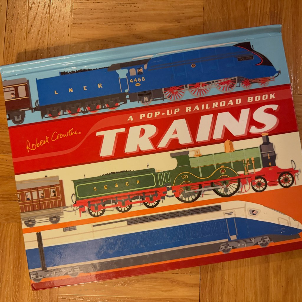 TRAINS, cover